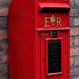 UK Royal Mail Box. Image by Peter Holmes from Pixabay.