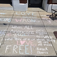 A picture of sidewalk drawings — a quote from Barak Obama in the main area “When ALL Americans are treated as equal no matter who they are or whom they love, we are all more FREE.”