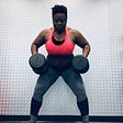 Strong woman lifting 100 lbs