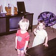 Two children in front of television, 1974