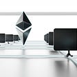 Two rows of computer monitor silhouettes with the Ethereum symbol, in black, in the middle.