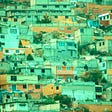 Rooftops in our former hometown of Pachuca, dotted with black water cisterns that are called tinacos. One of many homes that probably had mold. Photo: Uriel Miskas, Unsplash