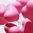 Heart shaped pink balloons