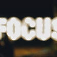 The word “Focus” made by light bulbs but slightly blurred