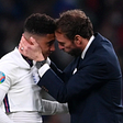 Gareth Southgate comforting Jadon Sancho after England lost the Euro 2020 Final