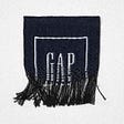 The fabric hang tag with The Gap logo unravels  and falls apart.