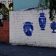 Amateur Greek mural of blue vases on Steward Street Brunswick Victoria