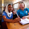 Australia for UNHCR National Director Naomi Steer with a refugee student in Ethiopia