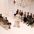 The Moschino puppet fashion show, with marionette models and audience