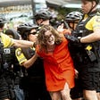 Woman protesting Proud Boys rally is detained by Portland police