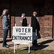 Voters wait in line outside a polling center on Election Day, Tuesday, Nov. 3, 2020, in Kenosha, Wis.