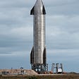 SpaceX’s Starship. Source: https://commons.wikimedia.org/wiki/File:Starship_SN9_Launch_Pad.jpg. Author: Jared Krahn, licensed under Creative Commons Attribution-Share Alike 4.0 International license.