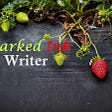 Strawberrry plants with green unripened strawberries and a single red strawberry draped over a slate grey beam. The words, ‘Sparked Ink Writer are overlaid in the centre left of the image.
