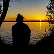 Me sitting alone at sunset in southern Sweden