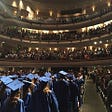 indoor college graduation ceremony