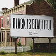 Ricky and Whitney Parker’s Black Is Beautiful billboard in Richmond, Virginia.