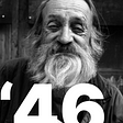 An old white man with a bushy greying beard and wrinkled face. What life has he led that we are oblivious to? Modified by Zane Dickens with a '46 to track his 100 stories and include a link to his father in law's birth year.