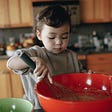 Little kid baking in the kitchen