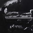 Still picture from The Seventh Seal by Ingmar Bergman. Shows Max Von Sydow playing chess with the personification of death played by Bengt Ekerot.
