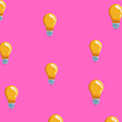 Lightbulbs on top of a bright pink background