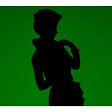 A landscape silhouette of a porcelain doll on a dark green background