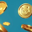 Gold cat tokens falling on a blue background.