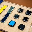 A photo of a disassembled Apple watch on display at a store.