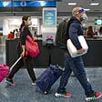 Travelers at Miami International Airport on Sunday, November 22, 2020.