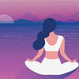 woman sitting on a beach at sunset meditating