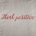 A motivational quote titled “Think Positive”