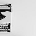 White portable typewriter, off-center