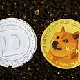 The front and back of dogecoin on dark crystal.