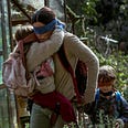 A still from the Netflix movie ‘Bird Box’ featuring Sandra Bullock as and child actors Julian Edwards (Boy) and Vivien Lyra Blair (Girl).