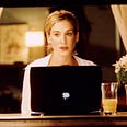 Carrie and her iconic, trusty Mac. Image credit: HBO