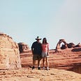 A photo of me and my dad at Arches National Park