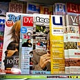 A newsstand displaying various magazines