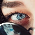 Close up shot of a woman’s blue eyeball.