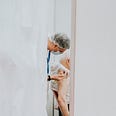 A healthcare worker administers a COVID-19 vaccine to an elderly man. Credit: Mat Napo via Unsplash.