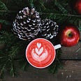 Apples, pinecones and hot beverage for a rustic holiday feeling.