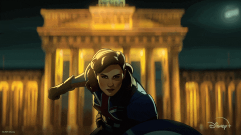 Peggy Carter wearing a Union Flag uniform and holding a shield showing the Union Flag from Marvel’s What If…?