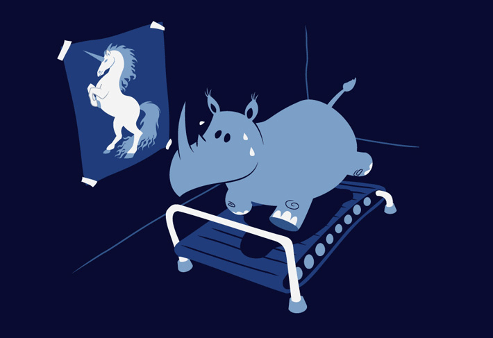 A rhinoceros on a treadmill staring at a picture of a unicorn for inspiration