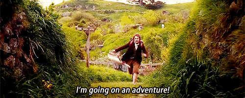Scene from The Fellowship of the Ring, with Frodo Baggins running in The Shire, exclaiming, “I’m going on an adventure!”