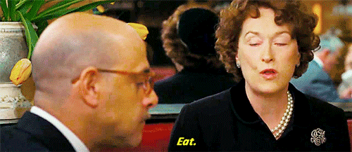 meryl streep in julie and julia sitting at a restaurant saying “eat”