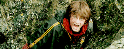 Harry Potter waving wand.