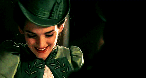 An animated GIF showing Gary Oldman as Dracula flirting with Winona Ryder as Mina Harker