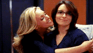 Jane Krakowski kissing Tina Fey aggressively all over her face