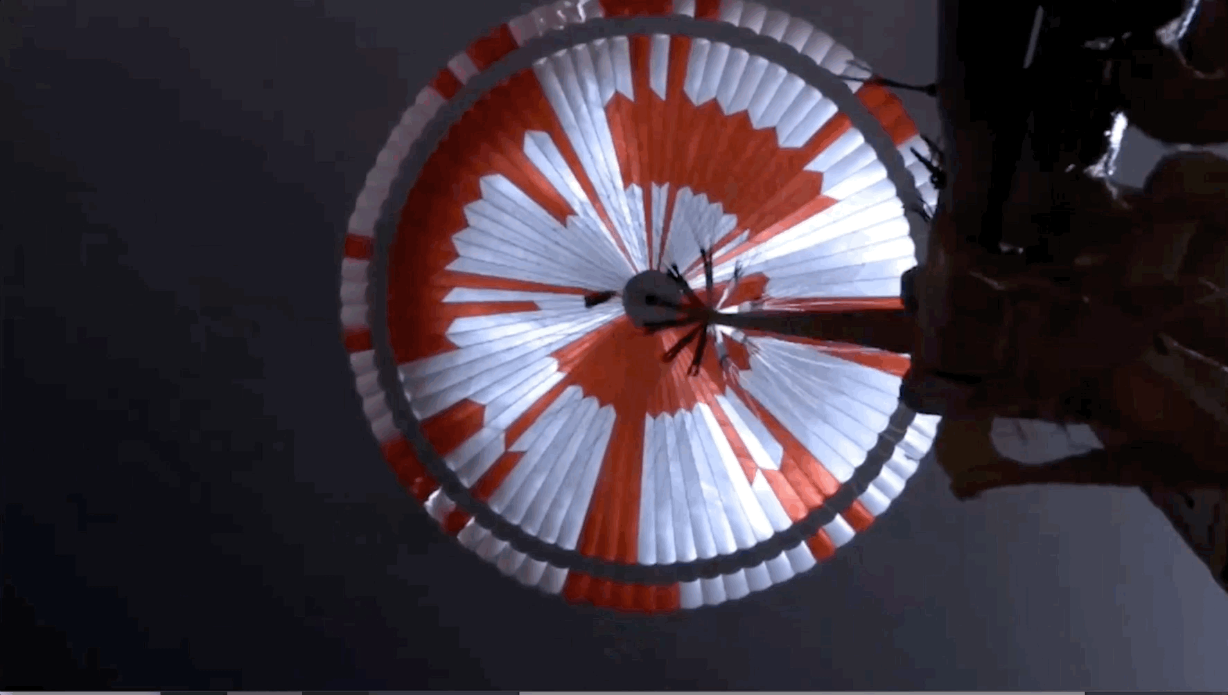 Actual footage from the Perseverance rover looking up at its parachute as it was landing on Mars in February 2021. You can view the entire descent video here. Image credit: NASA/JPL-Caltech