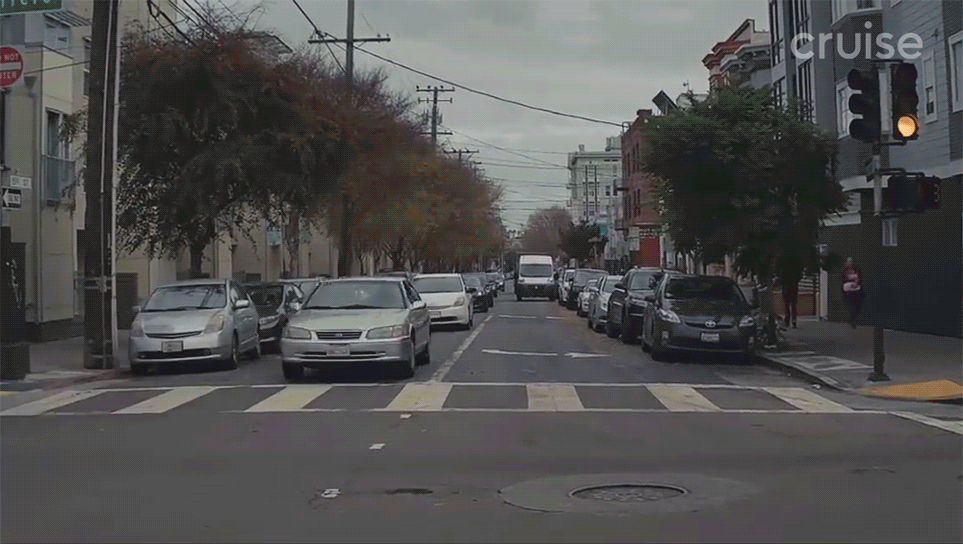 An archival clip of a Cruise self-driving vehicle performing an unprotected left turn.
