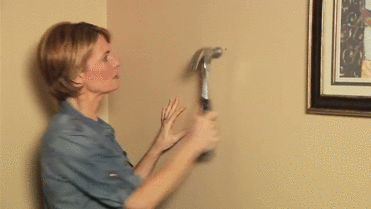 lady smashing wall