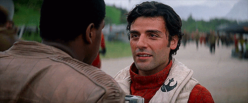 GIF image from Star Wars The Force Awakens of Oscar Isaac biting his lower lip.